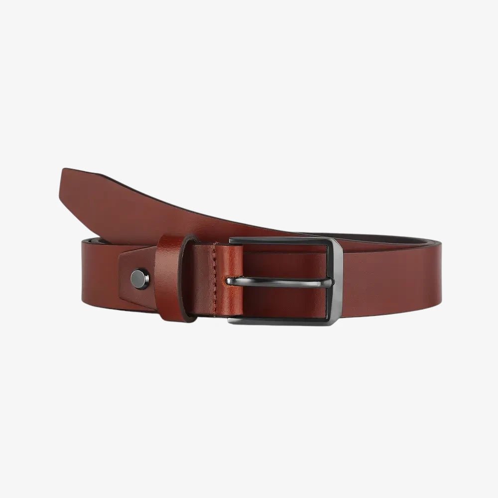 Front view of Cognac leather belt with a silver buckle on a white background