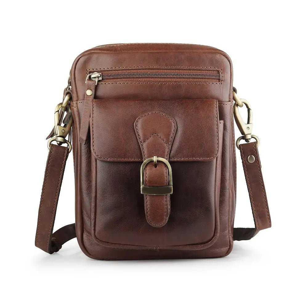 Front view of brown leather crossbody messenger bag with buckle-style flap pocket and zip compartment